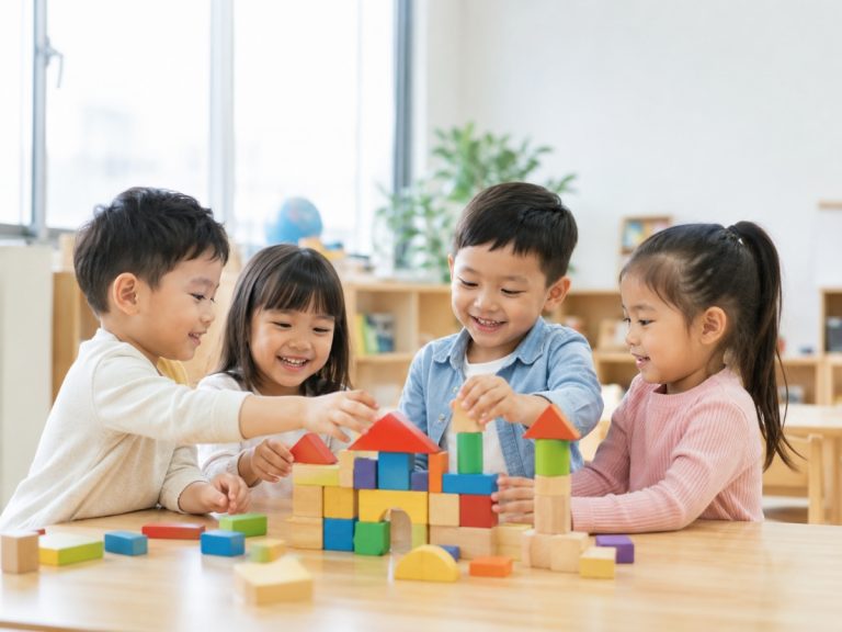 Children building with wooden building blocks in a bright preschool classroom to develop creativity and early learning skills